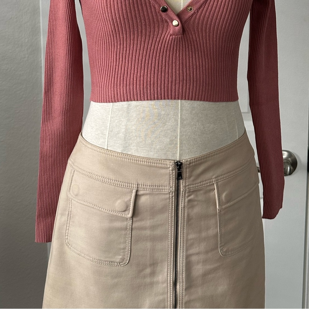 Anne Klein petites mini skirt with zipper front and functional pockets.